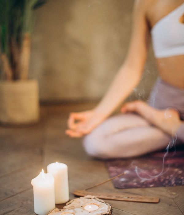 Woman in a calm yoga pose, embodying harmony and balance.